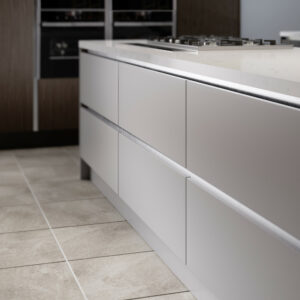 Kitchen unit showcasing a serica slab supermatt door in light grey