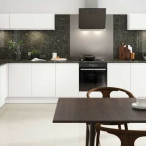 Matt white kitchen featuring handleless doors