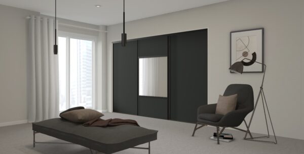 Bedroom with 3 door sliding bedroom doors in graphite colour including one pane with decorative mirrored glass